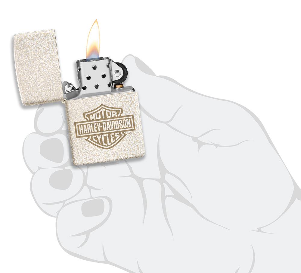 Harley-Davidson® Bar and Shield Logo Mercury Glass Windproof Lighter lit in hand
