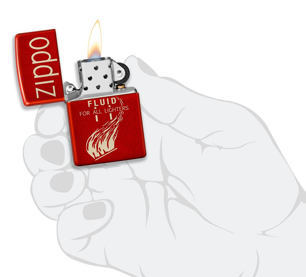 Zippo Retro Design Metallic Red Windproof Lighter lit in hand